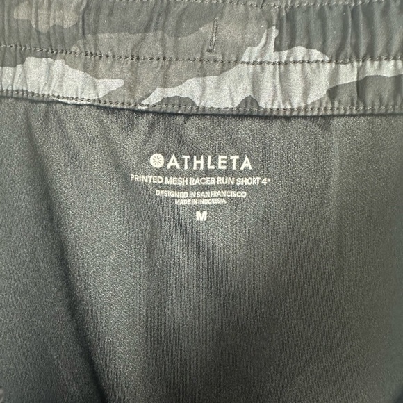Athleta Mesh Run Racer 4" athletic shorts. Women's size medium. Black camo. - Picture 4 of 6